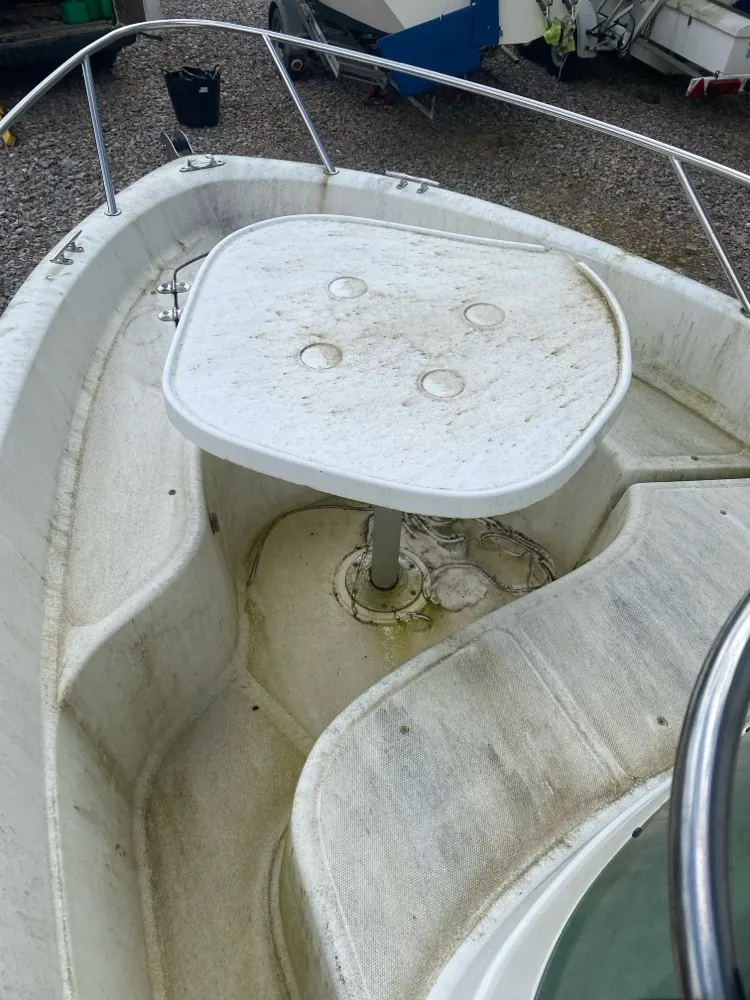 A boat cockpit before cleaning